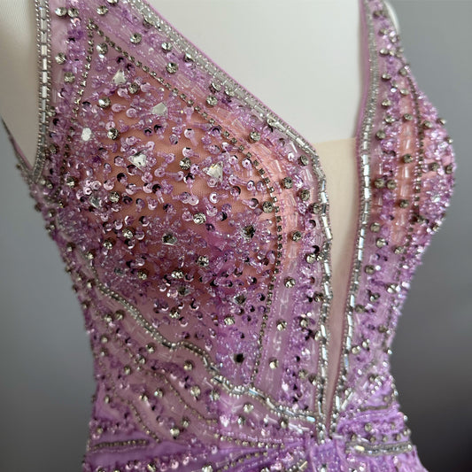 Robe à plumes lilas - location